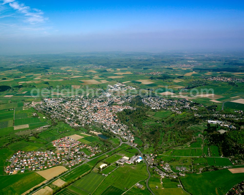 Grünberg from the bird's eye view: Urban area with outskirts and inner city area on the edge of agricultural fields and arable land in Grünberg in the state Hesse, Germany