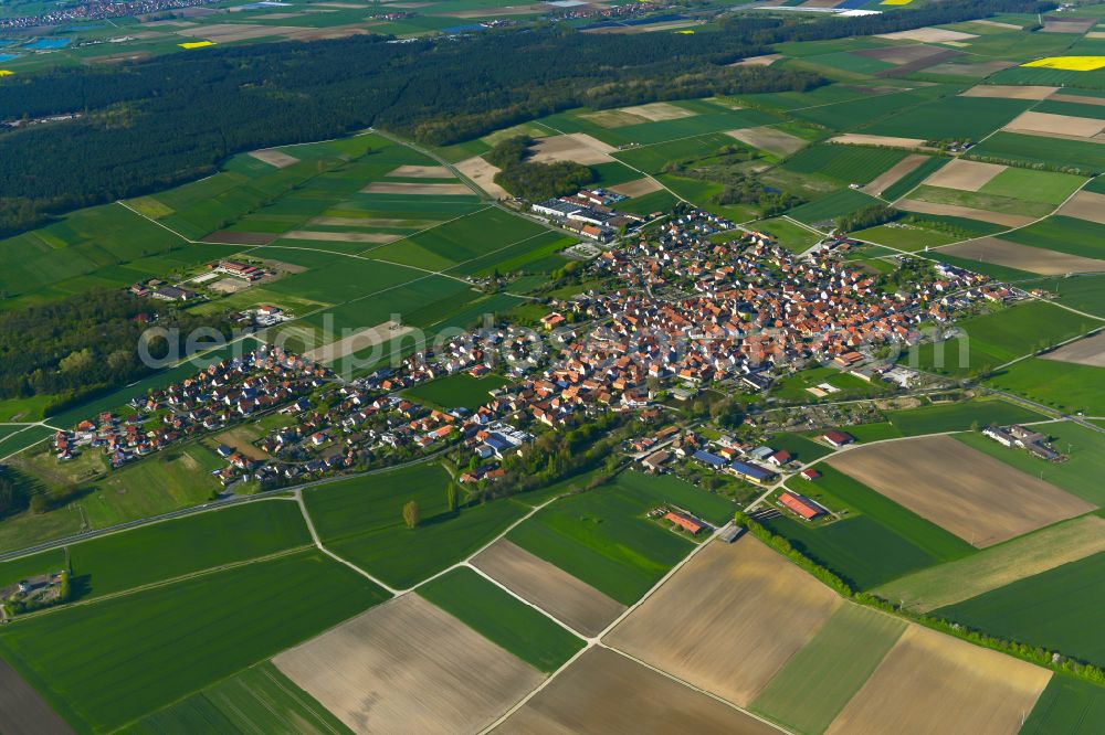 Aerial photograph Großlangheim - Urban area with outskirts and inner city area on the edge of agricultural fields and arable land in Großlangheim in the state Bavaria, Germany