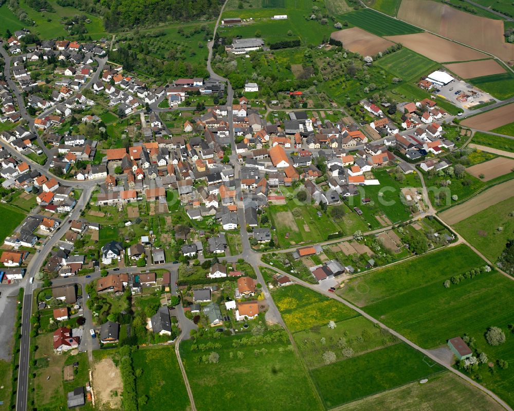 Aerial image Harbach - Urban area with outskirts and inner city area on the edge of agricultural fields and arable land in Harbach in the state Hesse, Germany