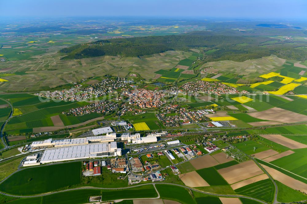 Hellmitzheim from above - Urban area with outskirts and inner city area on the edge of agricultural fields and arable land in Hellmitzheim in the state Bavaria, Germany