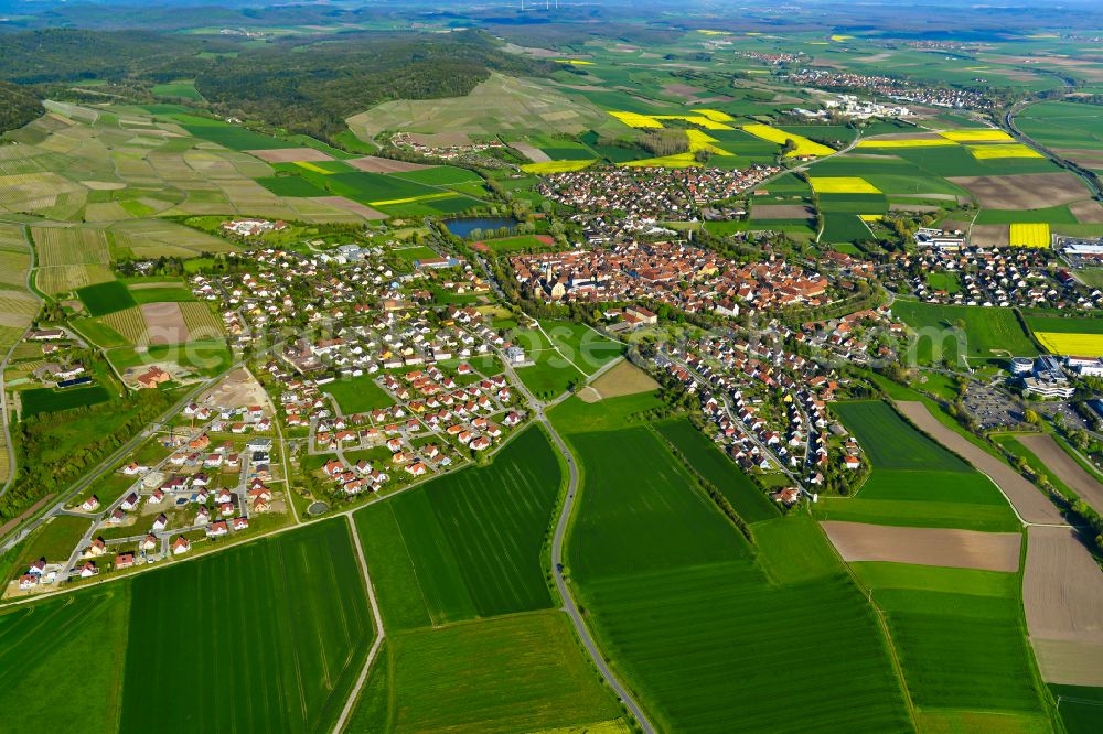 Hellmitzheim from above - Urban area with outskirts and inner city area on the edge of agricultural fields and arable land in Hellmitzheim in the state Bavaria, Germany