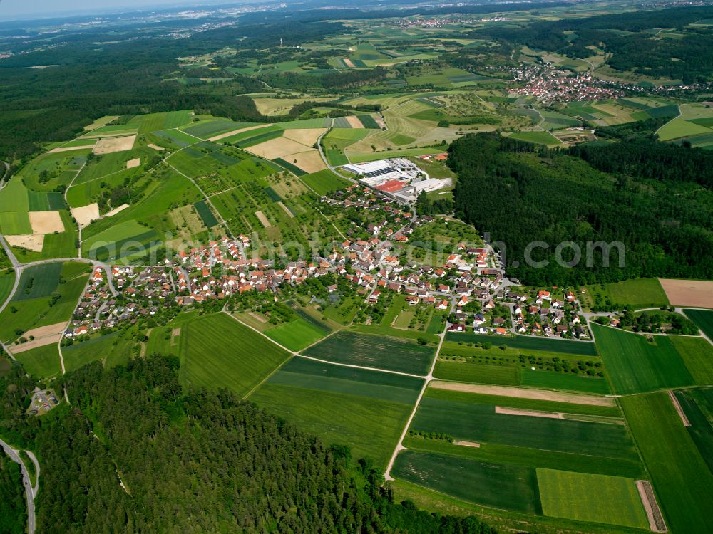 Aerial image Holzbronn - Urban area with outskirts and inner city area on the edge of agricultural fields and arable land in Holzbronn in the state Baden-Wuerttemberg, Germany