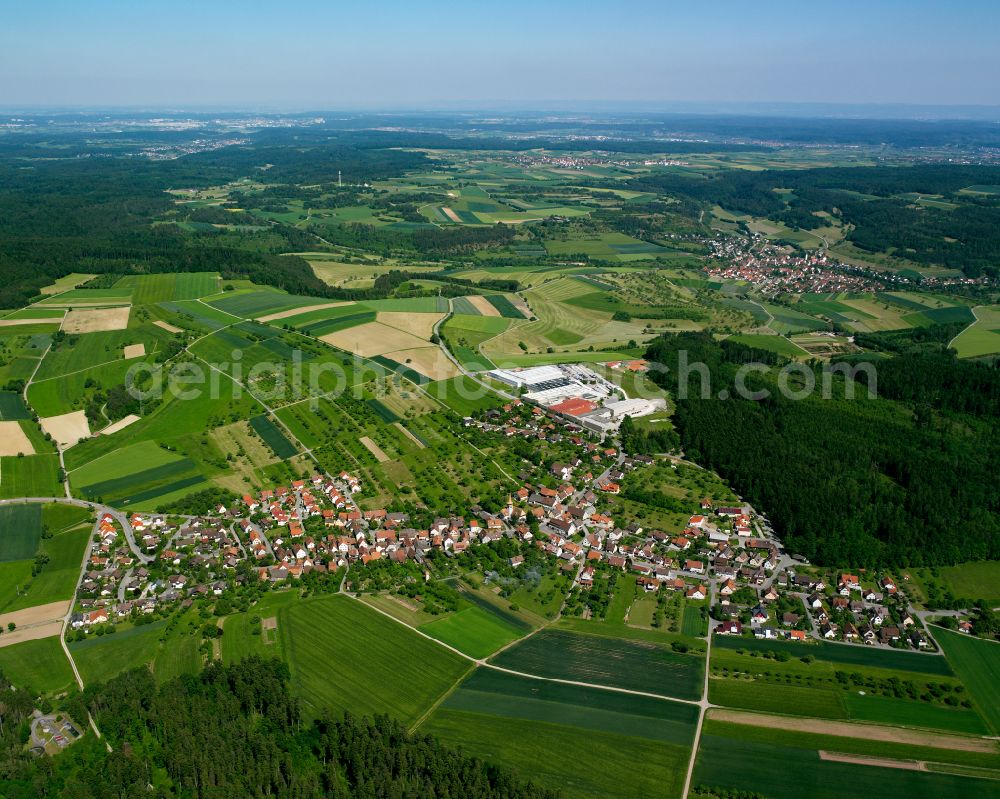 Aerial photograph Holzbronn - Urban area with outskirts and inner city area on the edge of agricultural fields and arable land in Holzbronn in the state Baden-Wuerttemberg, Germany