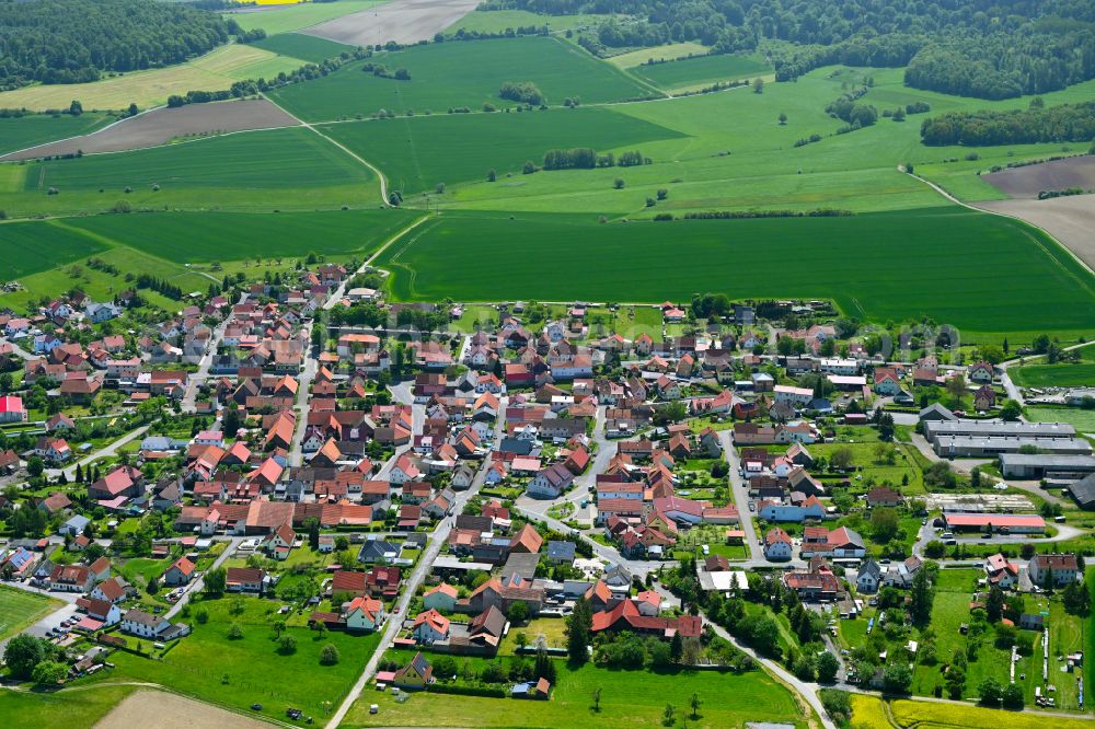 Kaltenwestheim from the bird's eye view: Urban area with outskirts and inner city area on the edge of agricultural fields and arable land in Kaltenwestheim in the state Thuringia, Germany