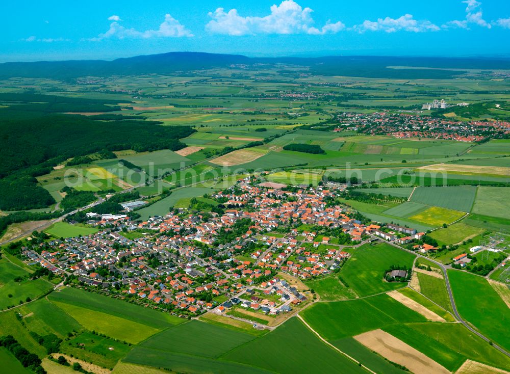 Aerial photograph Kerzenheim - Urban area with outskirts and inner city area on the edge of agricultural fields and arable land in Kerzenheim in the state Rhineland-Palatinate, Germany