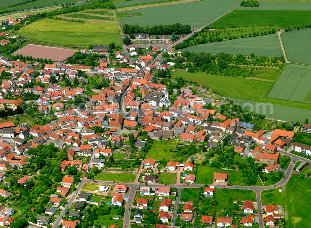 Kerzenheim from above - Urban area with outskirts and inner city area on the edge of agricultural fields and arable land in Kerzenheim in the state Rhineland-Palatinate, Germany