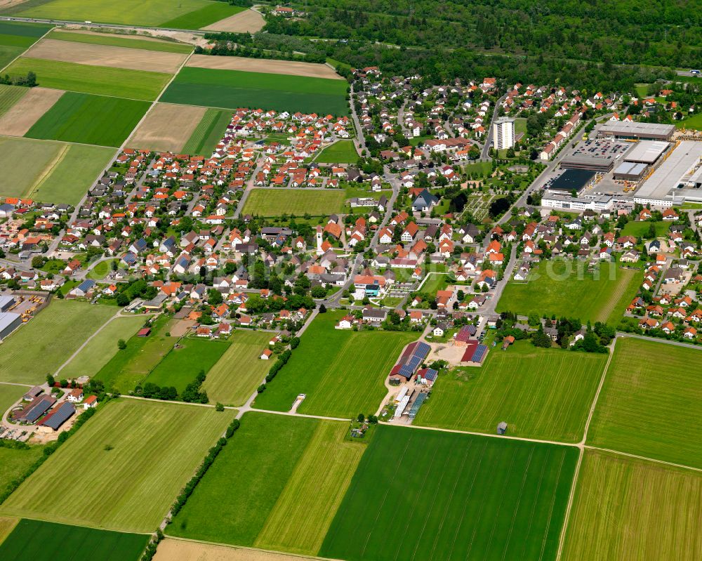 Kirchdorf an der Iller from the bird's eye view: Urban area with outskirts and inner city area on the edge of agricultural fields and arable land in Kirchdorf an der Iller in the state Baden-Wuerttemberg, Germany