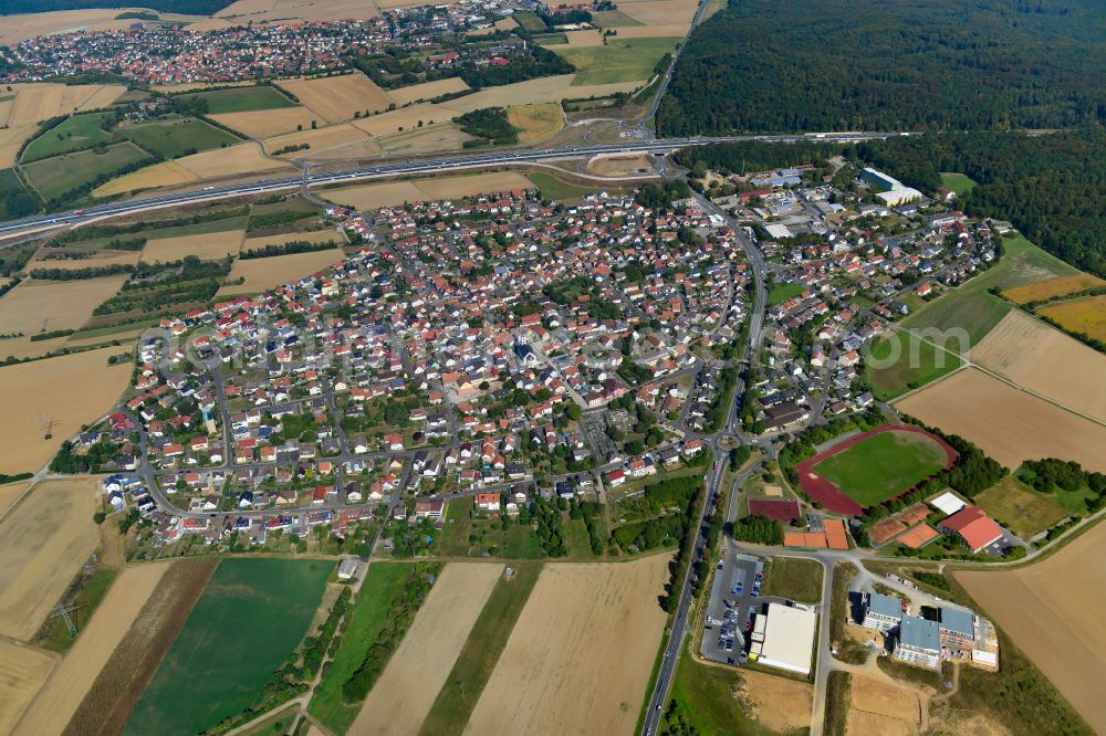 Kist from above - Urban area with outskirts and inner city area on the edge of agricultural fields and arable land in Kist in the state Bavaria, Germany