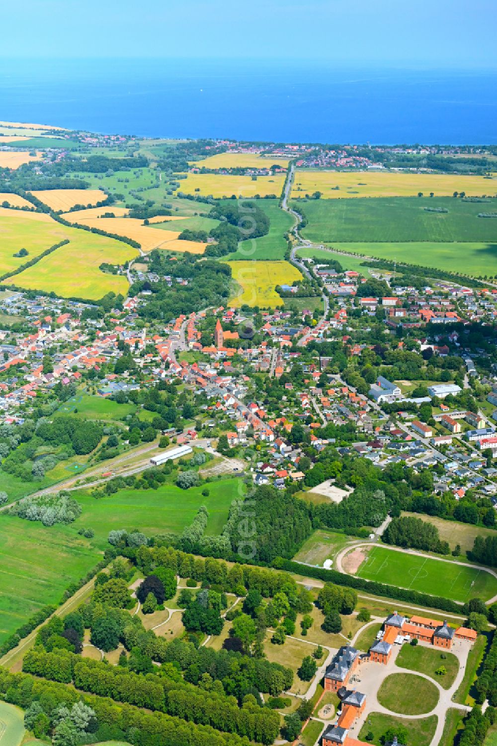 Aerial image Klütz - Urban area with outskirts and inner city area on the edge of agricultural fields and arable land in Klütz in the state Mecklenburg - Western Pomerania, Germany