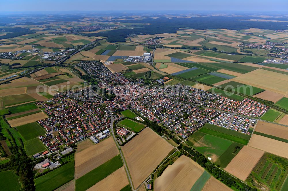 Kürnach from above - Urban area with outskirts and inner city area on the edge of agricultural fields and arable land in Kürnach in the state Bavaria, Germany