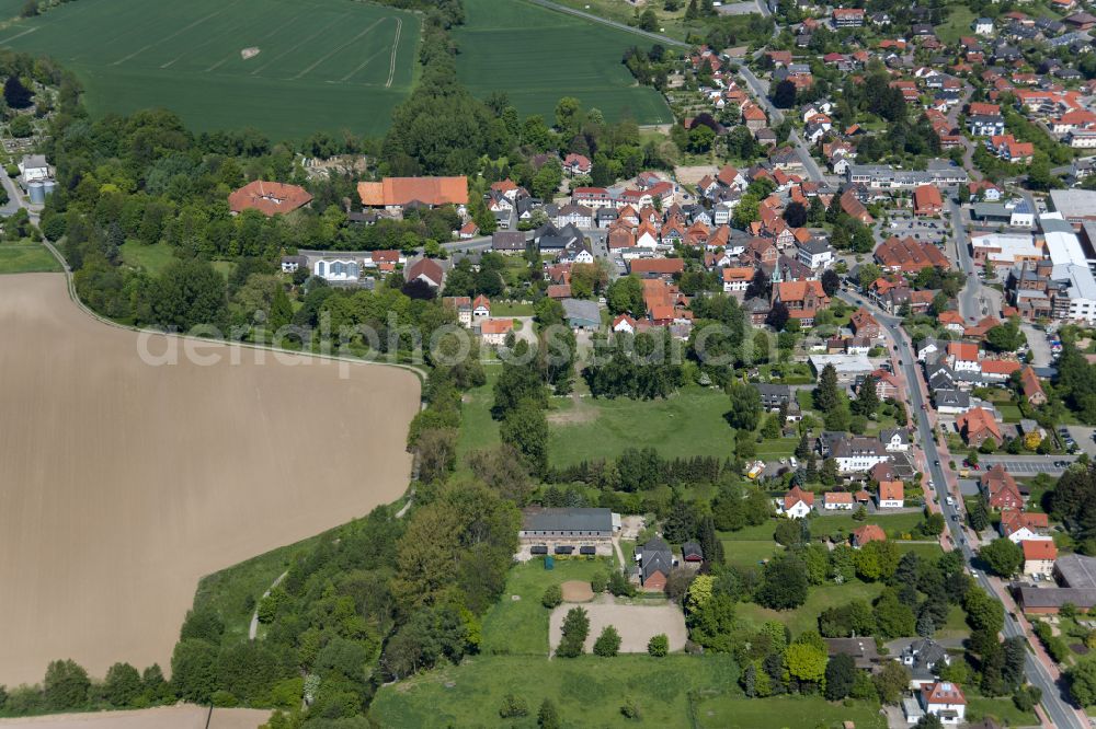 Aerial image Lauenau - Urban area with outskirts and inner city area on the edge of agricultural fields and arable land in Lauenau in the state Lower Saxony, Germany