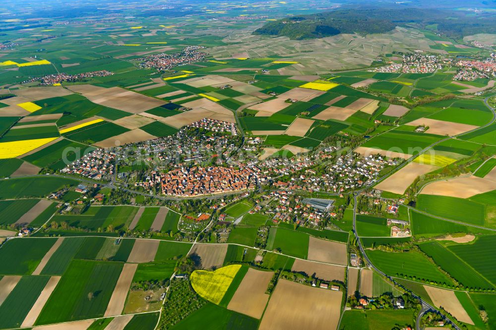 Mainbernheim from the bird's eye view: Urban area with outskirts and inner city area on the edge of agricultural fields and arable land in Mainbernheim in the state Bavaria, Germany