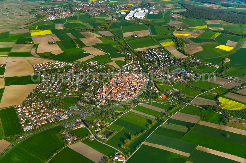 Aerial image Mainbernheim - Urban area with outskirts and inner city area on the edge of agricultural fields and arable land in Mainbernheim in the state Bavaria, Germany