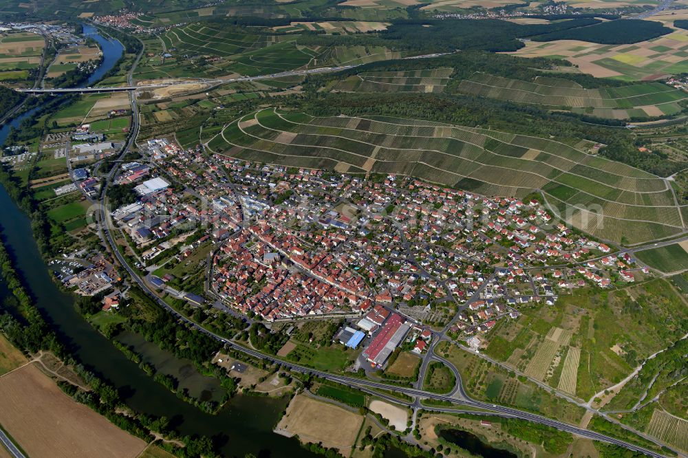 Mainmühle from the bird's eye view: Urban area with outskirts and inner city area on the edge of agricultural fields and arable land in Mainmühle in the state Bavaria, Germany