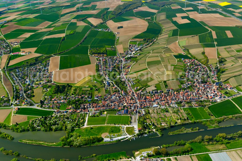 Aerial image Mainstockheim - Urban area with outskirts and inner city area on the edge of agricultural fields and arable land in Mainstockheim in the state Bavaria, Germany