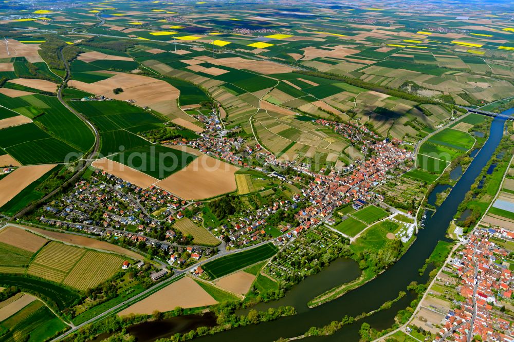 Mainstockheim from above - Urban area with outskirts and inner city area on the edge of agricultural fields and arable land in Mainstockheim in the state Bavaria, Germany