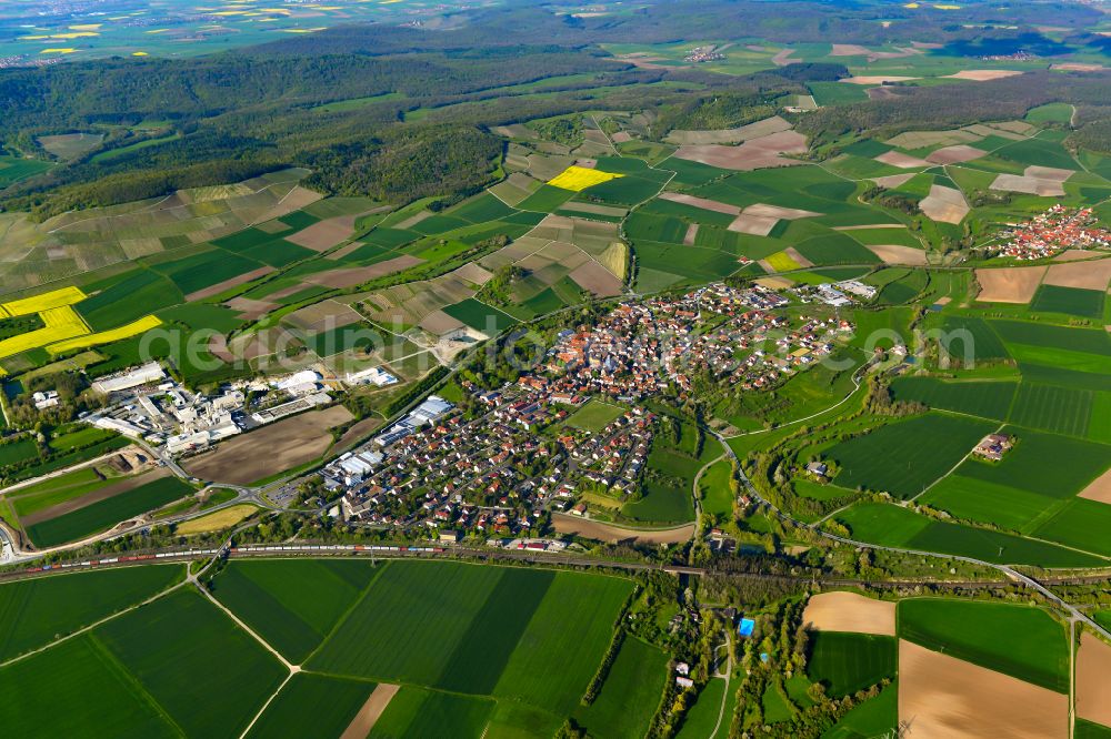 Markt Einersheim from above - Urban area with outskirts and inner city area on the edge of agricultural fields and arable land in Markt Einersheim in the state Bavaria, Germany