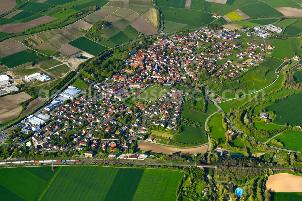 Markt Einersheim from the bird's eye view: Urban area with outskirts and inner city area on the edge of agricultural fields and arable land in Markt Einersheim in the state Bavaria, Germany