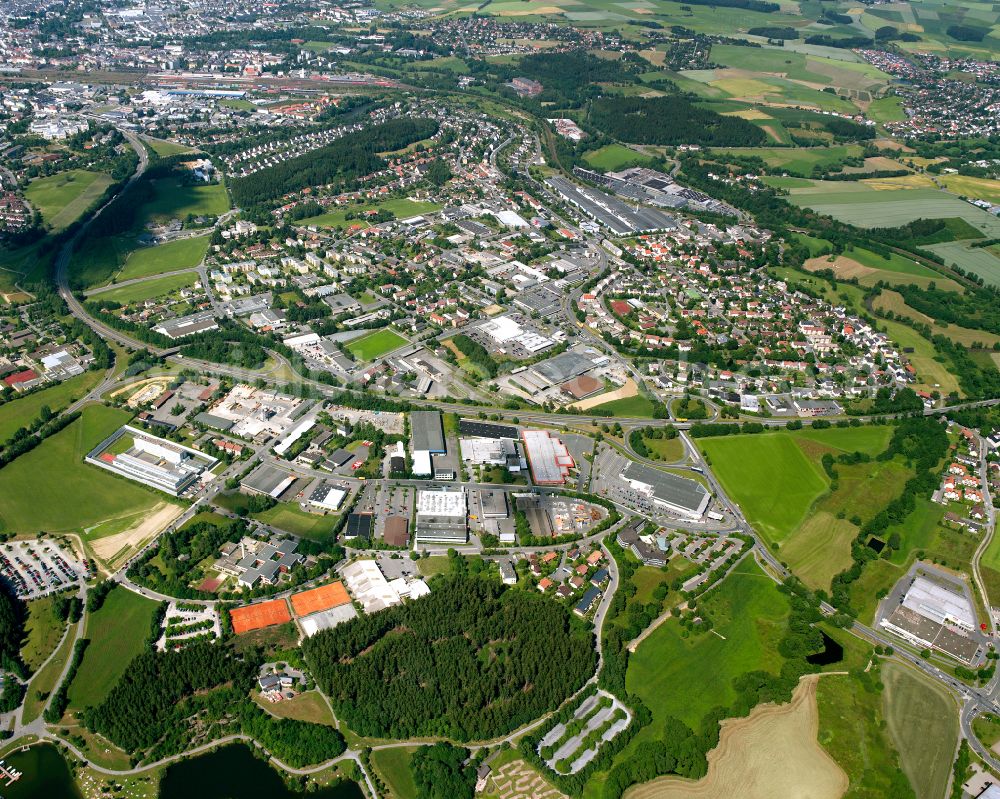 Aerial photograph Moschendorf - Urban area with outskirts and inner city area on the edge of agricultural fields and arable land in Moschendorf in the state Bavaria, Germany