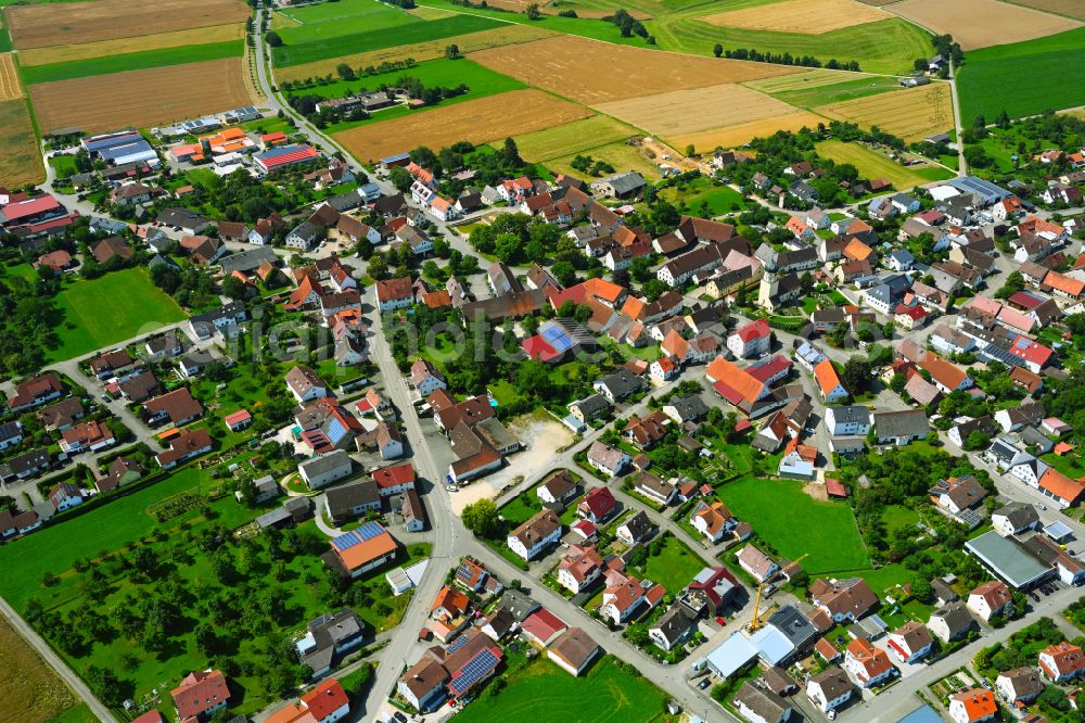 Neenstetten from the bird's eye view: Urban area with outskirts and inner city area on the edge of agricultural fields and arable land in Neenstetten in the state Baden-Wuerttemberg, Germany