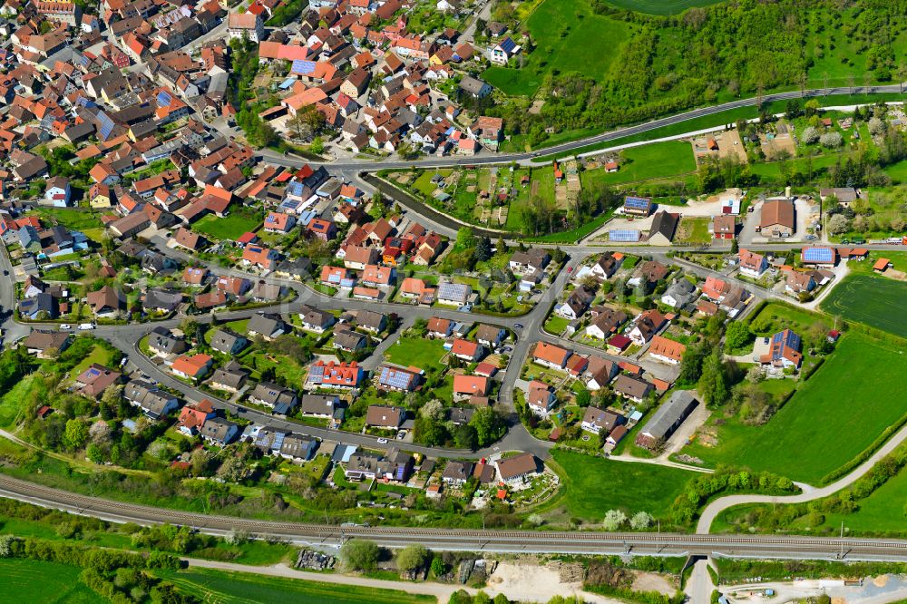 Aerial image Obernbreit - Urban area with outskirts and inner city area on the edge of agricultural fields and arable land in Obernbreit in the state Bavaria, Germany