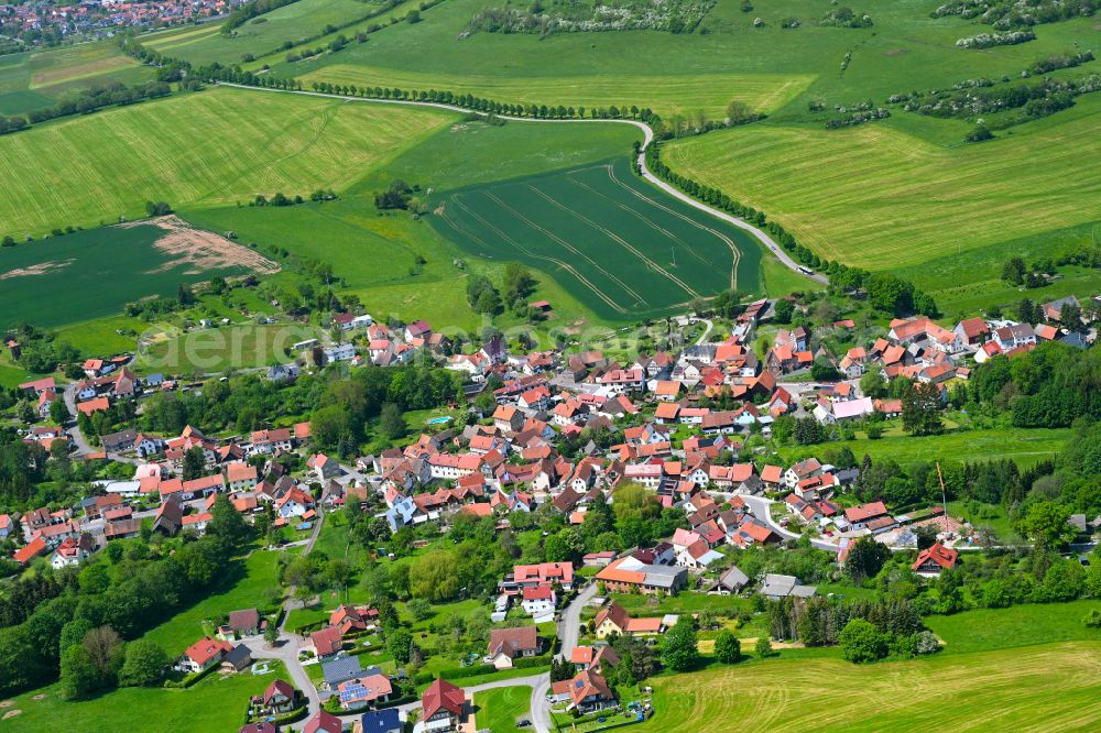 Aerial image Oberweid - Urban area with outskirts and inner city area on the edge of agricultural fields and arable land in Oberweid in the state Thuringia, Germany