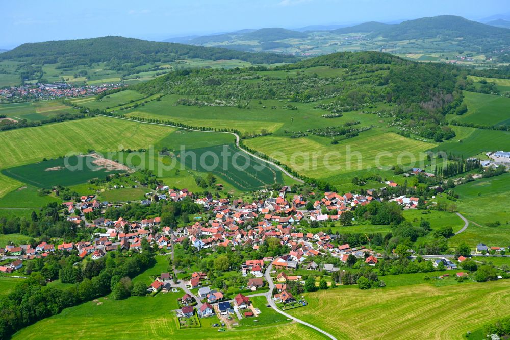 Oberweid from above - Urban area with outskirts and inner city area on the edge of agricultural fields and arable land in Oberweid in the state Thuringia, Germany