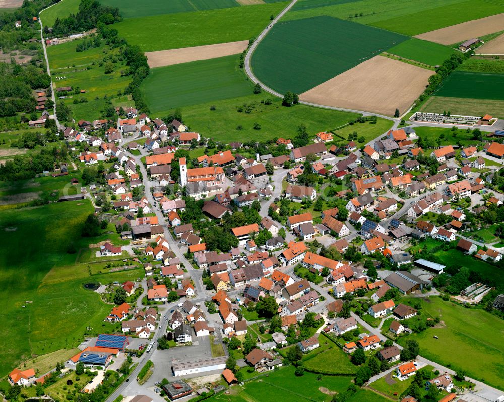 Aerial image Oggelshausen - Urban area with outskirts and inner city area on the edge of agricultural fields and arable land in Oggelshausen in the state Baden-Wuerttemberg, Germany