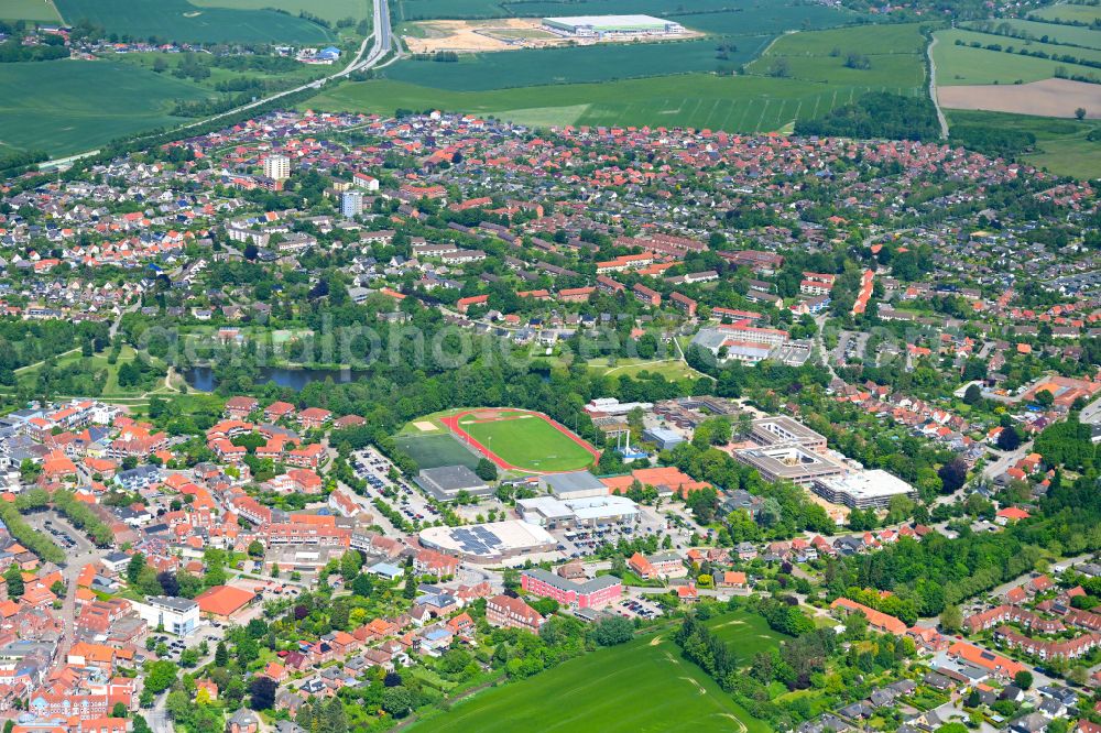 Oldenburg from above - Urban area with outskirts and inner city area on the edge of agricultural fields and arable land in Oldenburg in the state Schleswig-Holstein, Germany