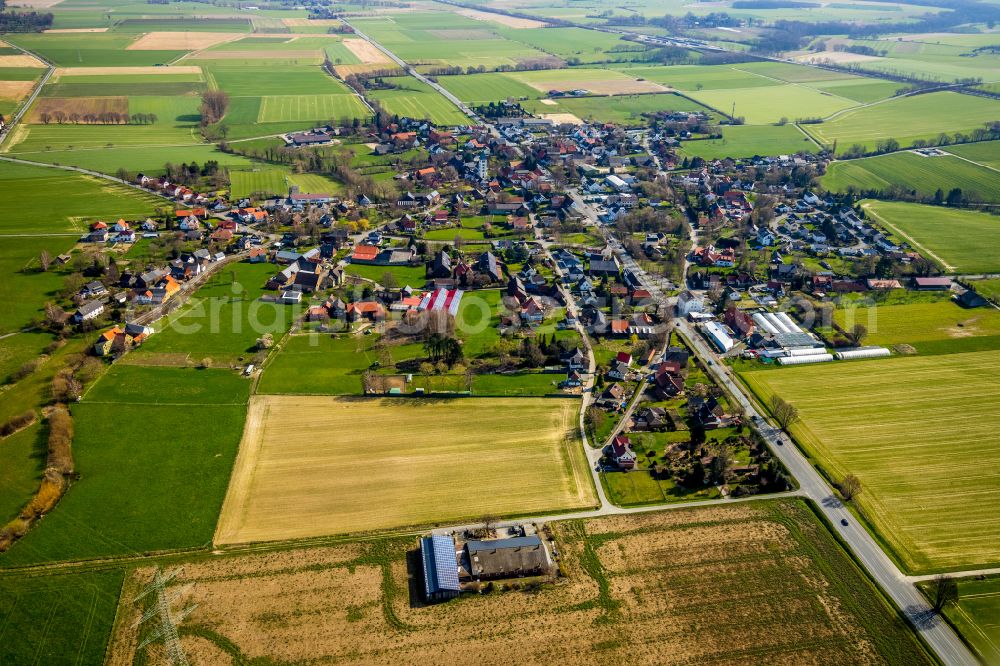 Ostönnen from above - Urban area with outskirts and inner city area on the edge of agricultural fields and arable land in Ostönnen at Ruhrgebiet in the state North Rhine-Westphalia, Germany