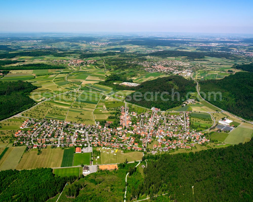 Ottenbronn from the bird's eye view: Urban area with outskirts and inner city area on the edge of agricultural fields and arable land in Ottenbronn in the state Baden-Wuerttemberg, Germany