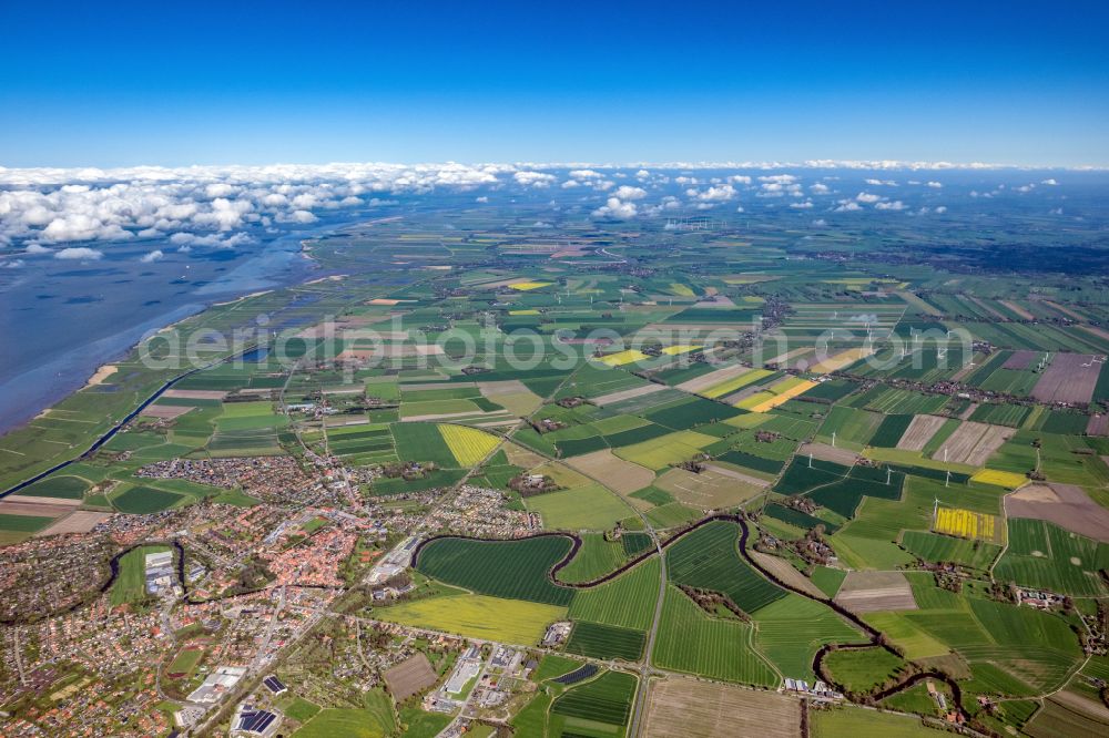 Otterndorf from above - Urban area with outskirts and inner city area on the edge of agricultural fields and arable land in Otterndorf in the state Lower Saxony, Germany