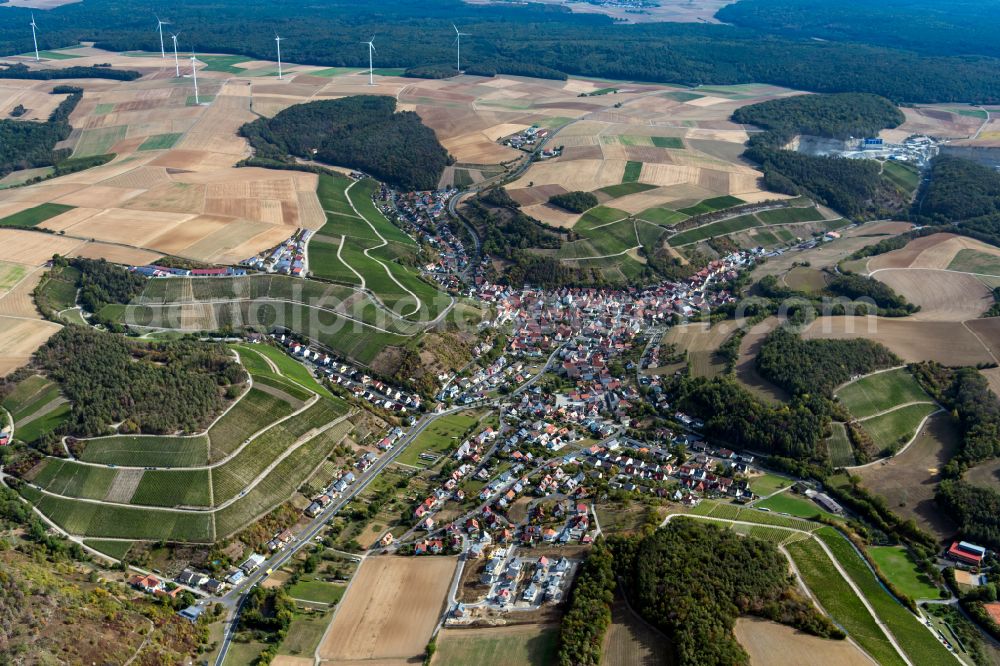 Retzstadt from above - Urban area with outskirts and inner city area on the edge of agricultural fields and arable land in Retzstadt in the state Bavaria, Germany