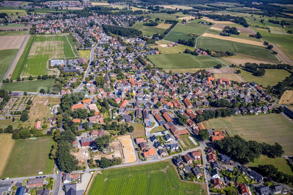 Aerial image Rhade - Urban area with outskirts and inner city area on the edge of agricultural fields and arable land in Rhade in the state North Rhine-Westphalia, Germany