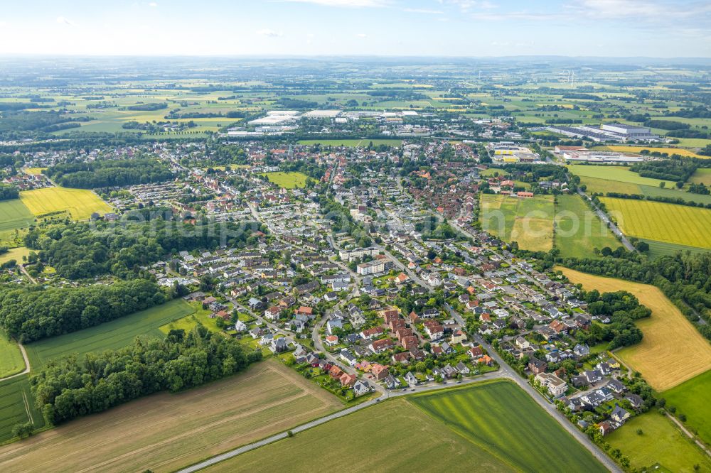 Aerial image Rhynern - Urban area with outskirts and inner city area on the edge of agricultural fields and arable land in Rhynern at Ruhrgebiet in the state North Rhine-Westphalia, Germany