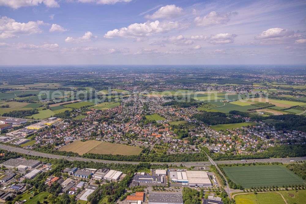 Aerial image Rhynern - Urban area with outskirts and inner city area on the edge of agricultural fields and arable land in Rhynern at Ruhrgebiet in the state North Rhine-Westphalia, Germany