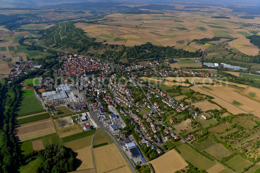 Aerial photograph Röttingen - Urban area with outskirts and inner city area on the edge of agricultural fields and arable land in Röttingen in the state Bavaria, Germany