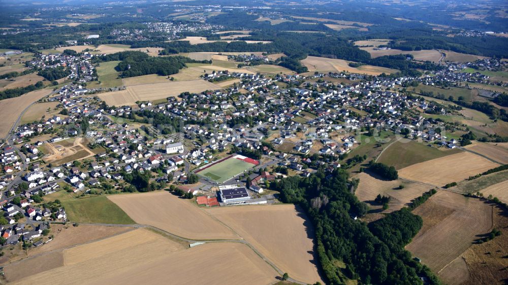 Sankt Katharinen from above - Urban area with outskirts and inner city area on the edge of agricultural fields and arable land in Sankt Katharinen in the state Rhineland-Palatinate, Germany