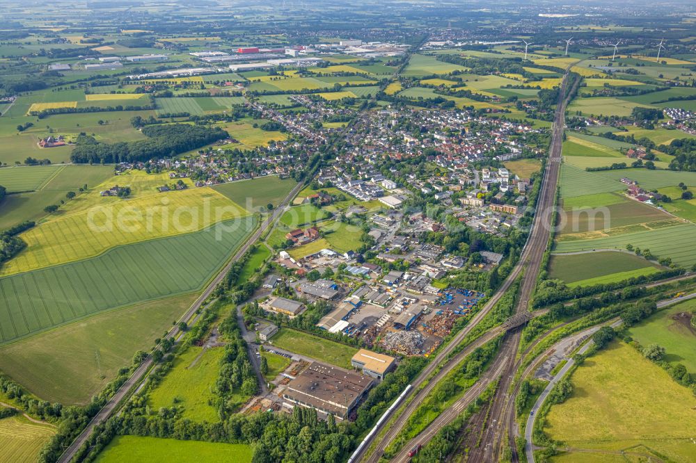 Aerial photograph Selmigerheide - Urban area with outskirts and inner city area on the edge of agricultural fields and arable land in Selmigerheide in the state North Rhine-Westphalia, Germany