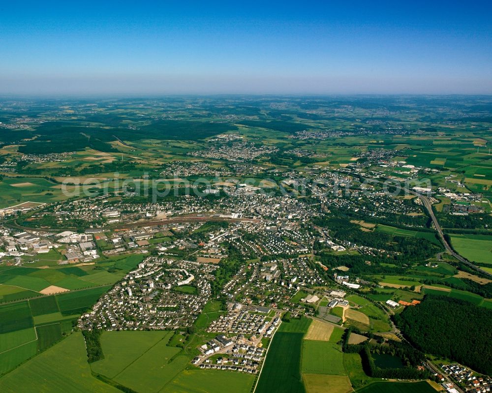 Aerial photograph Staffel - Urban area with outskirts and inner city area on the edge of agricultural fields and arable land in Staffel in the state Hesse, Germany