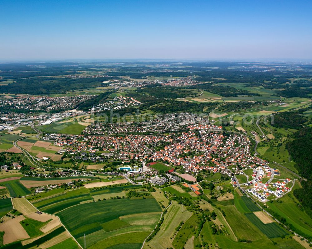 Stammheim from the bird's eye view: Urban area with outskirts and inner city area on the edge of agricultural fields and arable land in Stammheim in the state Baden-Wuerttemberg, Germany