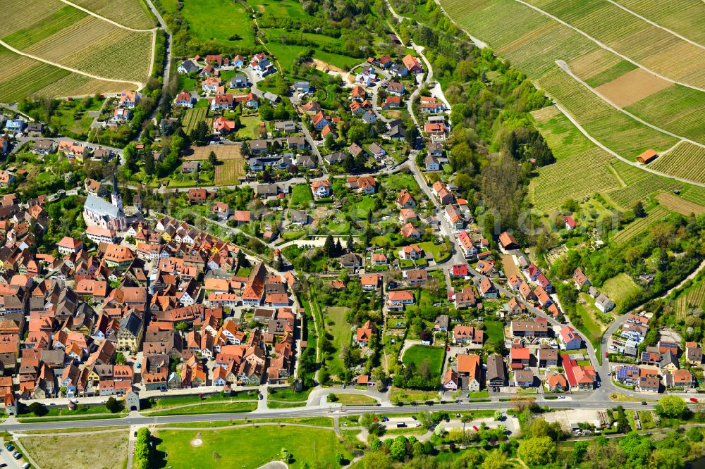 Sulzfeld am Main from the bird's eye view: Urban area with outskirts and inner city area on the edge of agricultural fields and arable land in Sulzfeld am Main in the state Bavaria, Germany