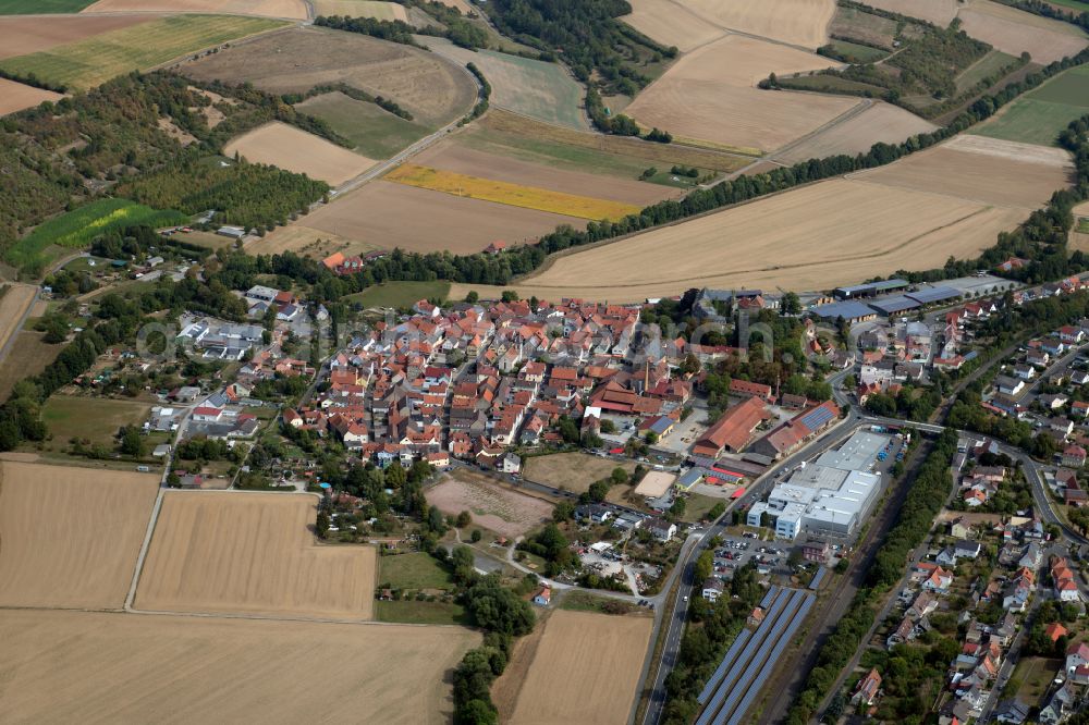 Aerial image Thüngen - Urban area with outskirts and inner city area on the edge of agricultural fields and arable land in Thüngen in the state Bavaria, Germany