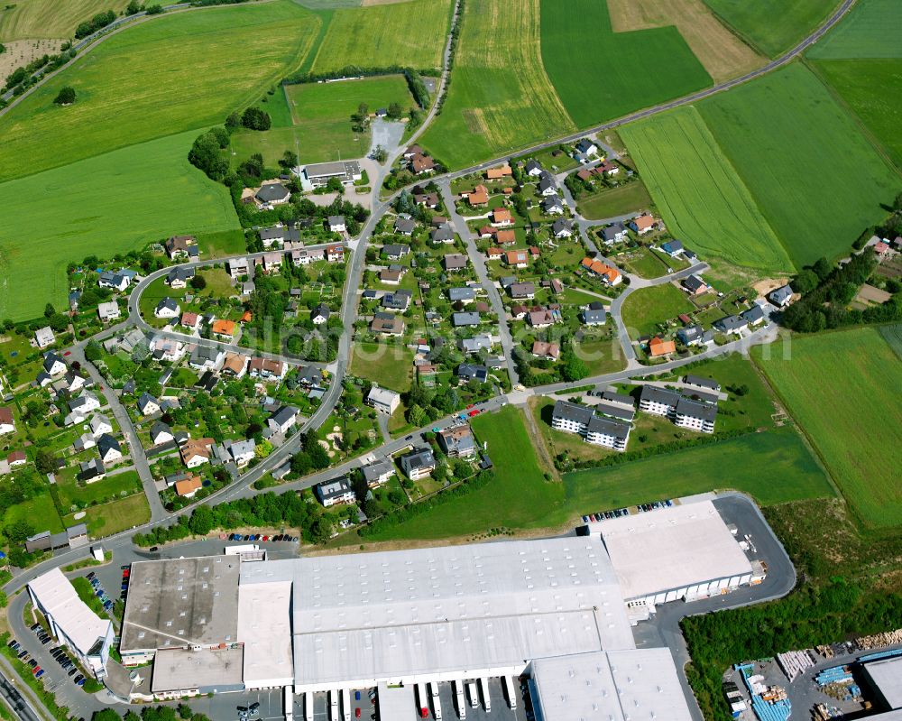 Töpen from the bird's eye view: Urban area with outskirts and inner city area on the edge of agricultural fields and arable land in Toepen in the state Bavaria, Germany