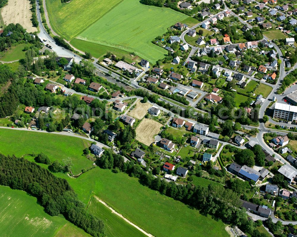 Aerial photograph Töpen - Urban area with outskirts and inner city area on the edge of agricultural fields and arable land in Toepen in the state Bavaria, Germany