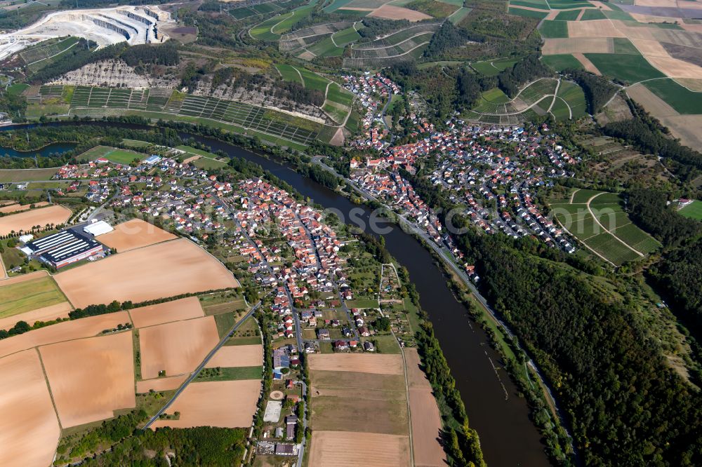 Aerial photograph Trennfeld - Urban area with outskirts and inner city area on the edge of agricultural fields and arable land in Trennfeld in the state Bavaria, Germany