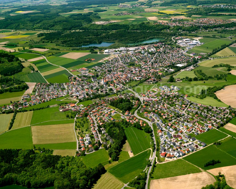 Aerial image Ummendorf - Urban area with outskirts and inner city area on the edge of agricultural fields and arable land in Ummendorf in the state Baden-Wuerttemberg, Germany