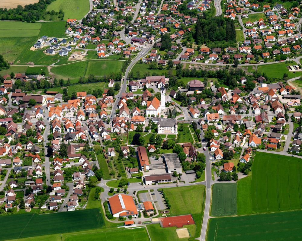 Ummendorf from the bird's eye view: Urban area with outskirts and inner city area on the edge of agricultural fields and arable land in Ummendorf in the state Baden-Wuerttemberg, Germany