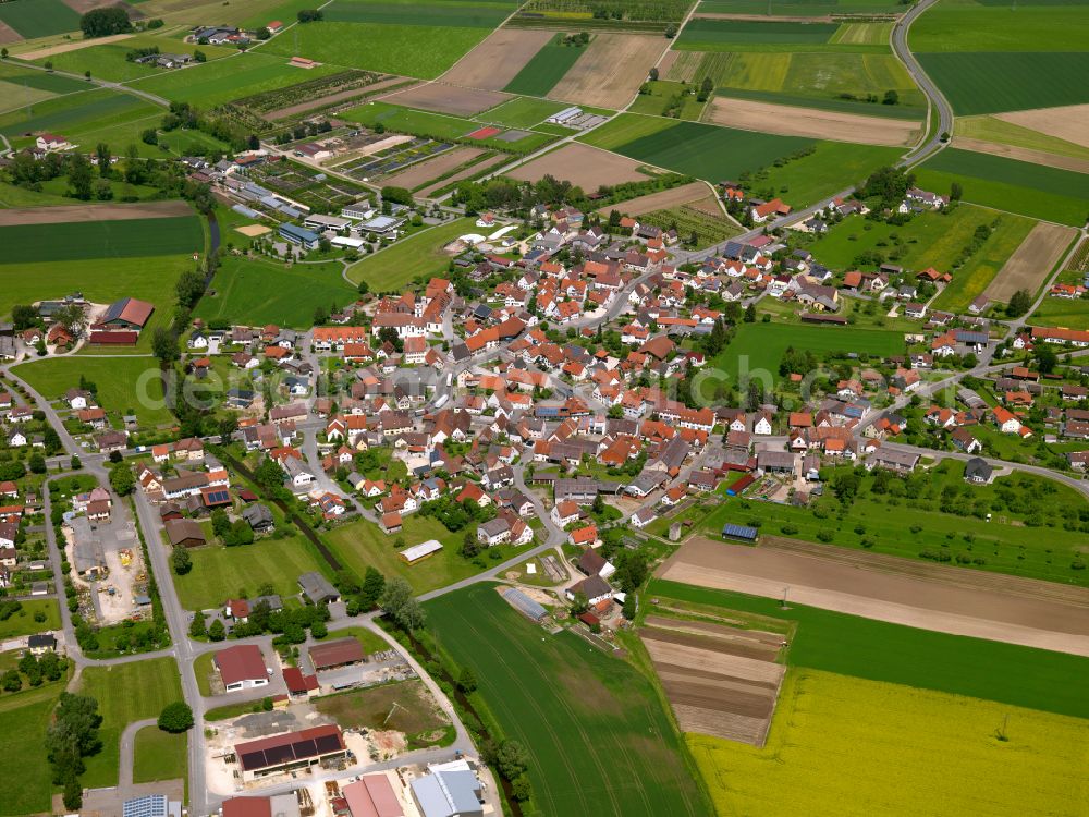 Unlingen from the bird's eye view: Urban area with outskirts and inner city area on the edge of agricultural fields and arable land in Unlingen in the state Baden-Wuerttemberg, Germany