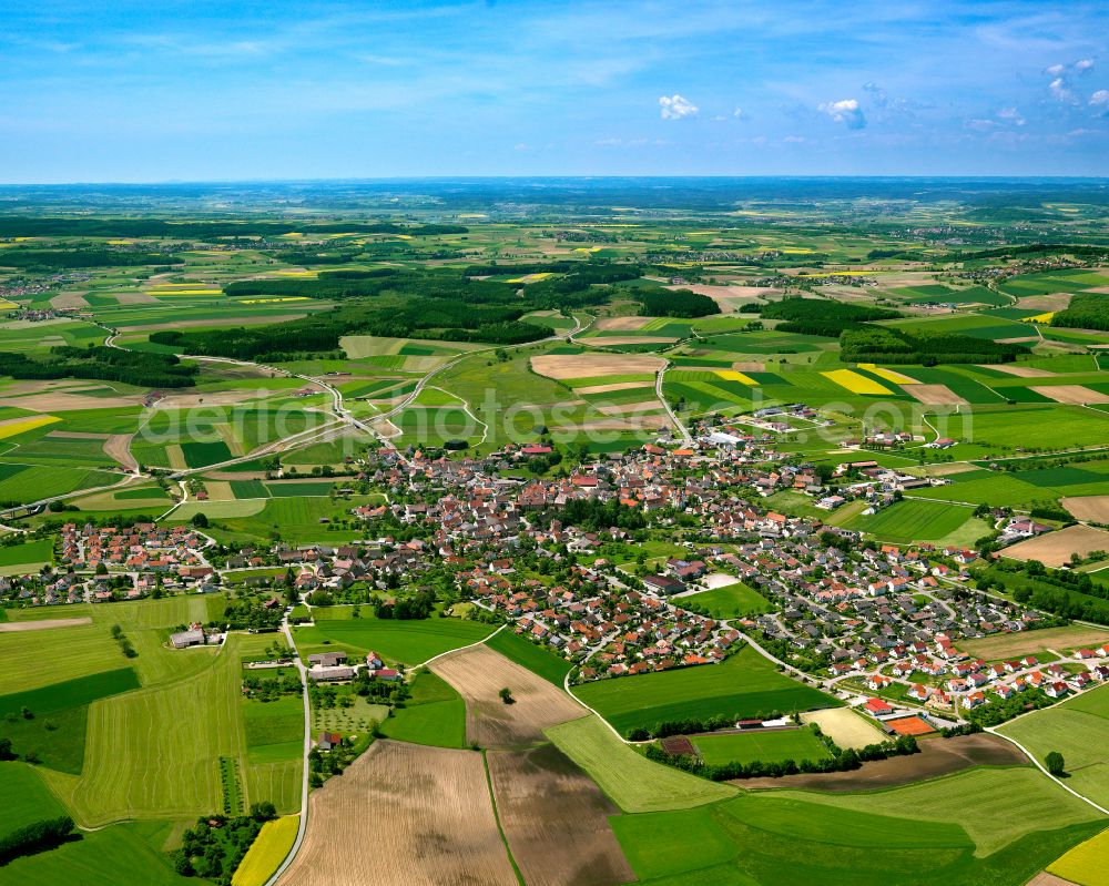 Uttenweiler from above - Urban area with outskirts and inner city area on the edge of agricultural fields and arable land in Uttenweiler in the state Baden-Wuerttemberg, Germany